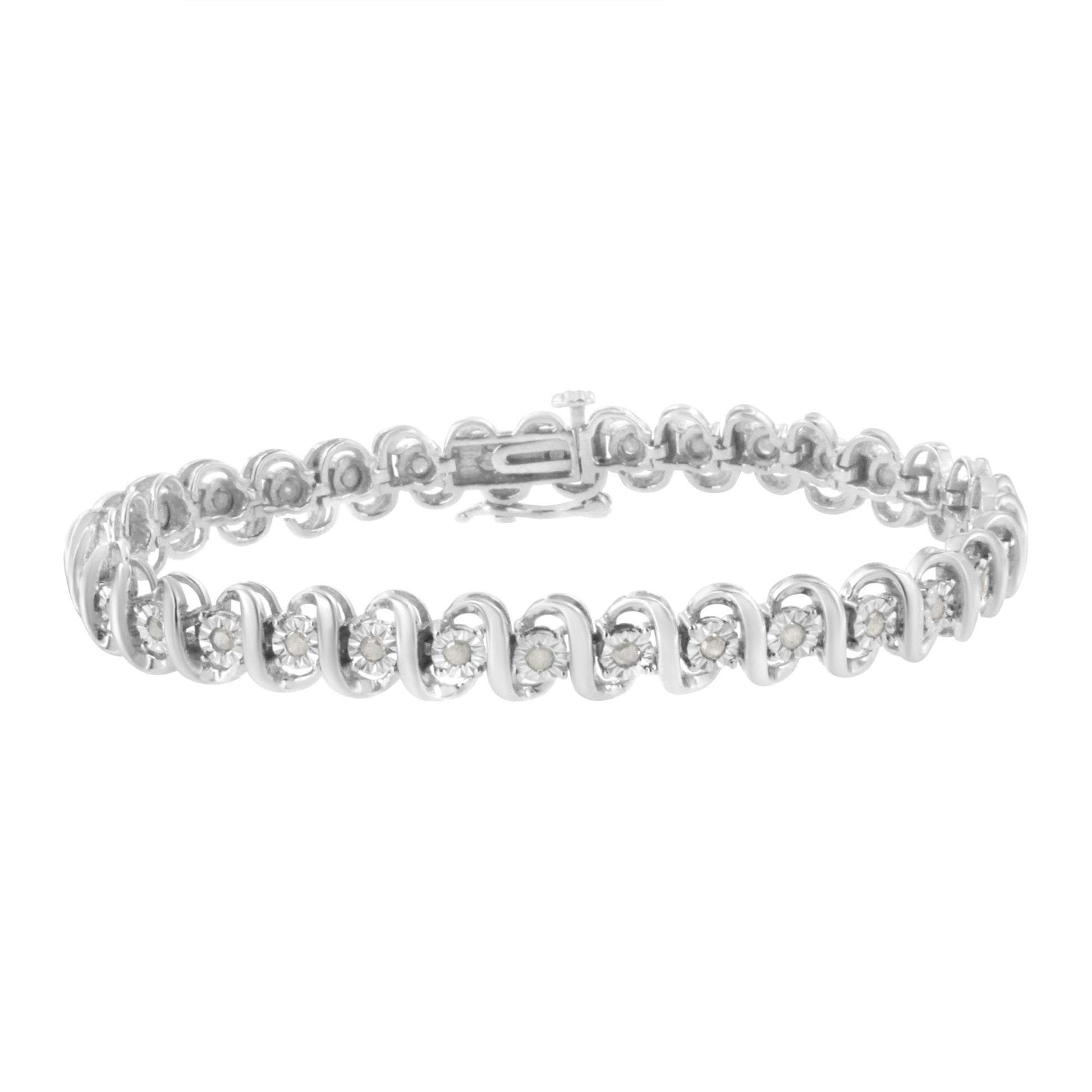White metal bracelet with round white gemstones set in a wavy pattern, shown from an angled front view.