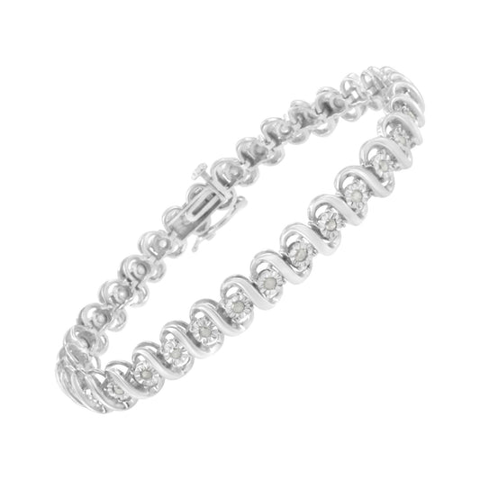 White metal bracelet with round white gemstones in a miracle setting, shown at an angled close-up.