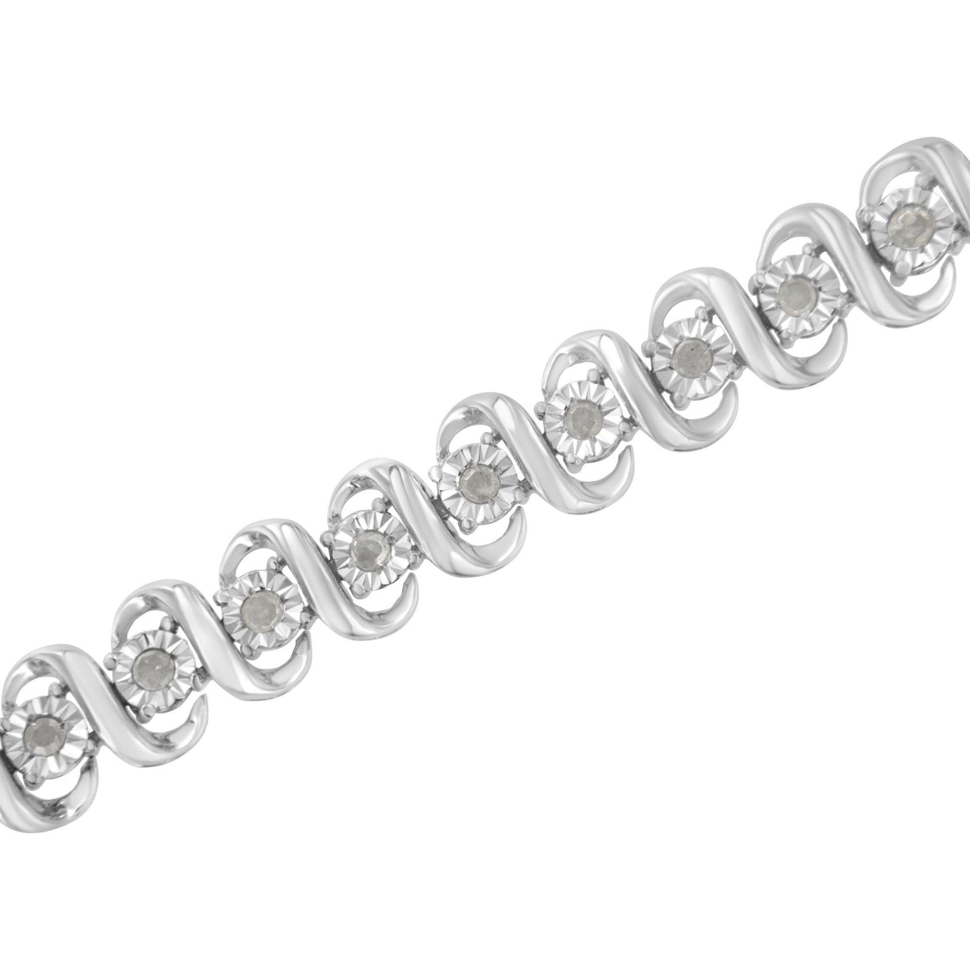 White metal bracelet with round white gemstones in a wave pattern, shown at a slight diagonal angle.