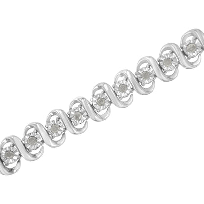 White metal bracelet with round white gemstones in a wave pattern, shown at a slight diagonal angle.