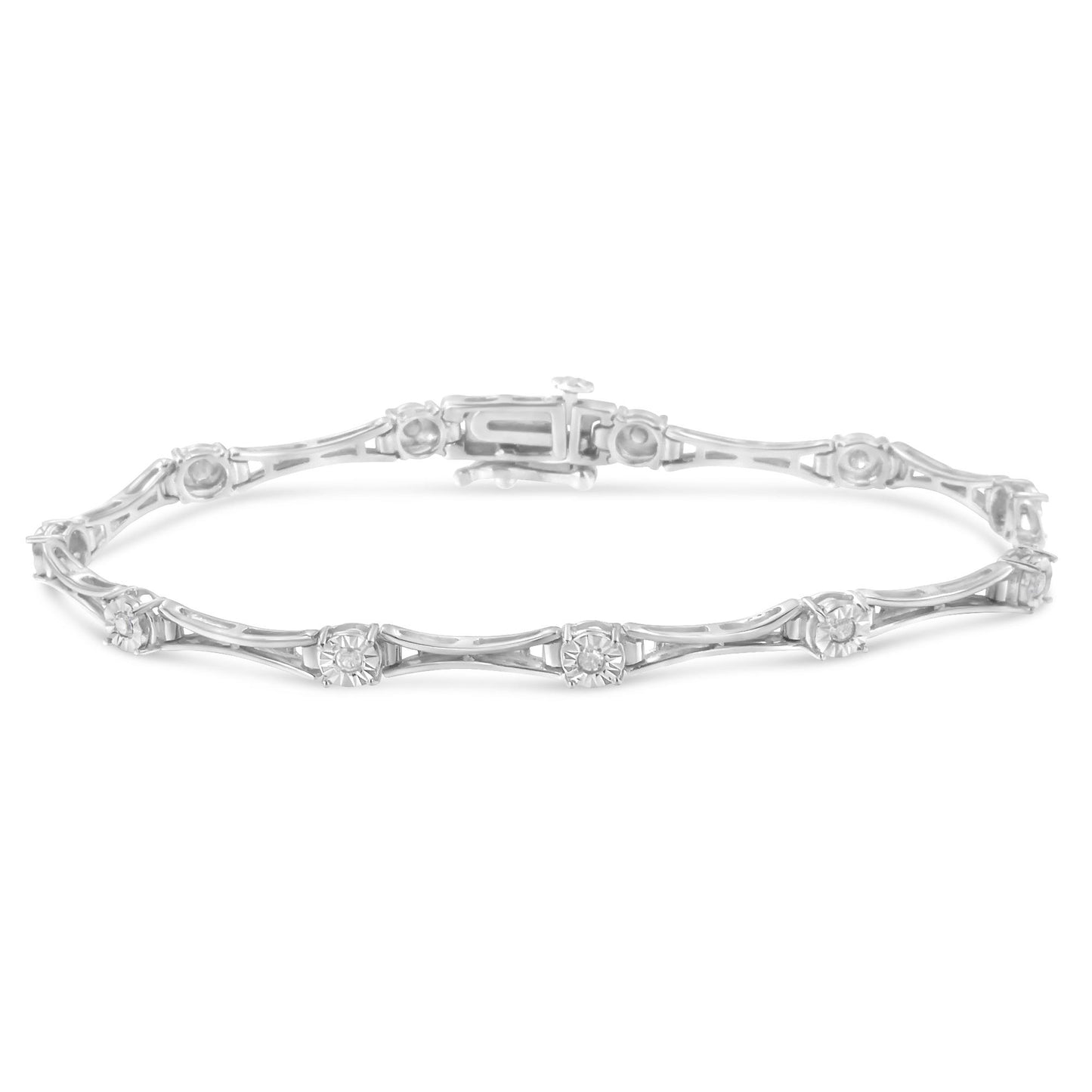 White metal bracelet with round white gemstones in miracle settings along the band, shown in a front angle shot.