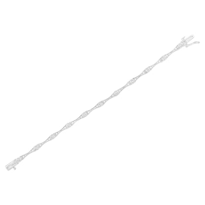 White bracelet with evenly spaced round white gemstones in miracle settings, shown flat from a top-down angle.