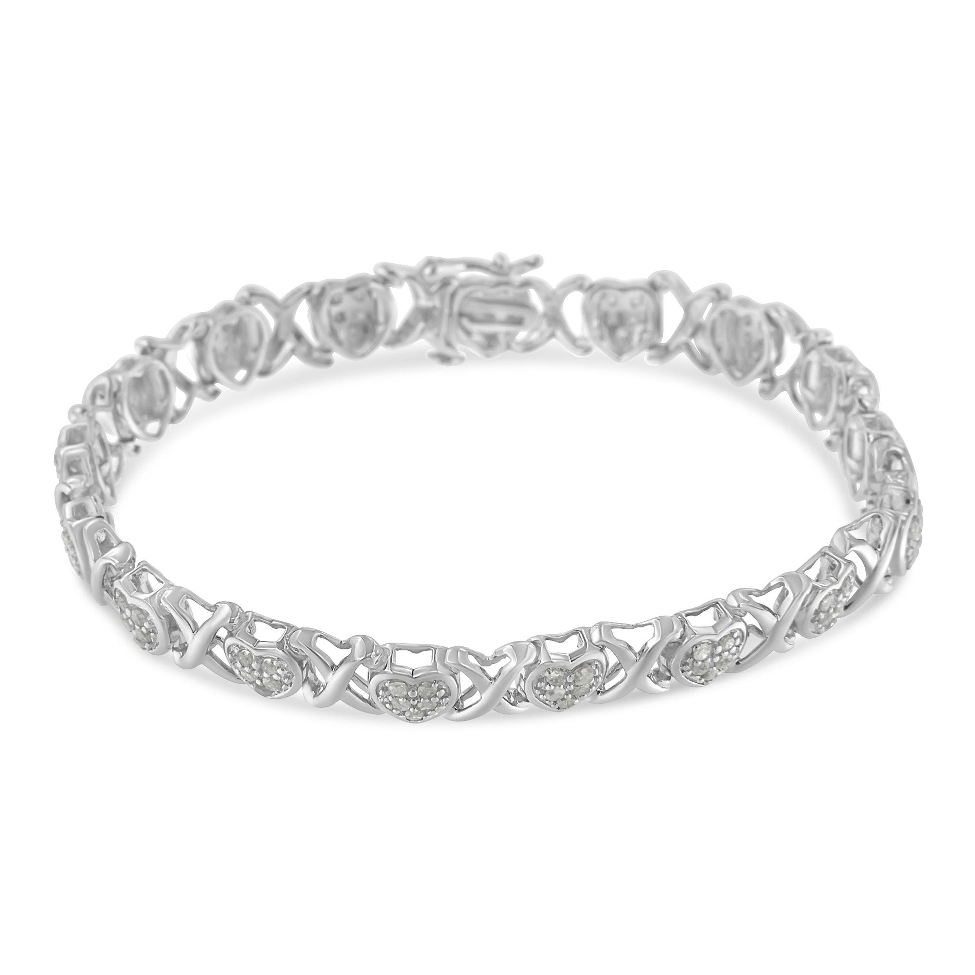White metal bracelet with heart-shaped links featuring pave-set white gemstones, shown from a slightly elevated angle on a white background.