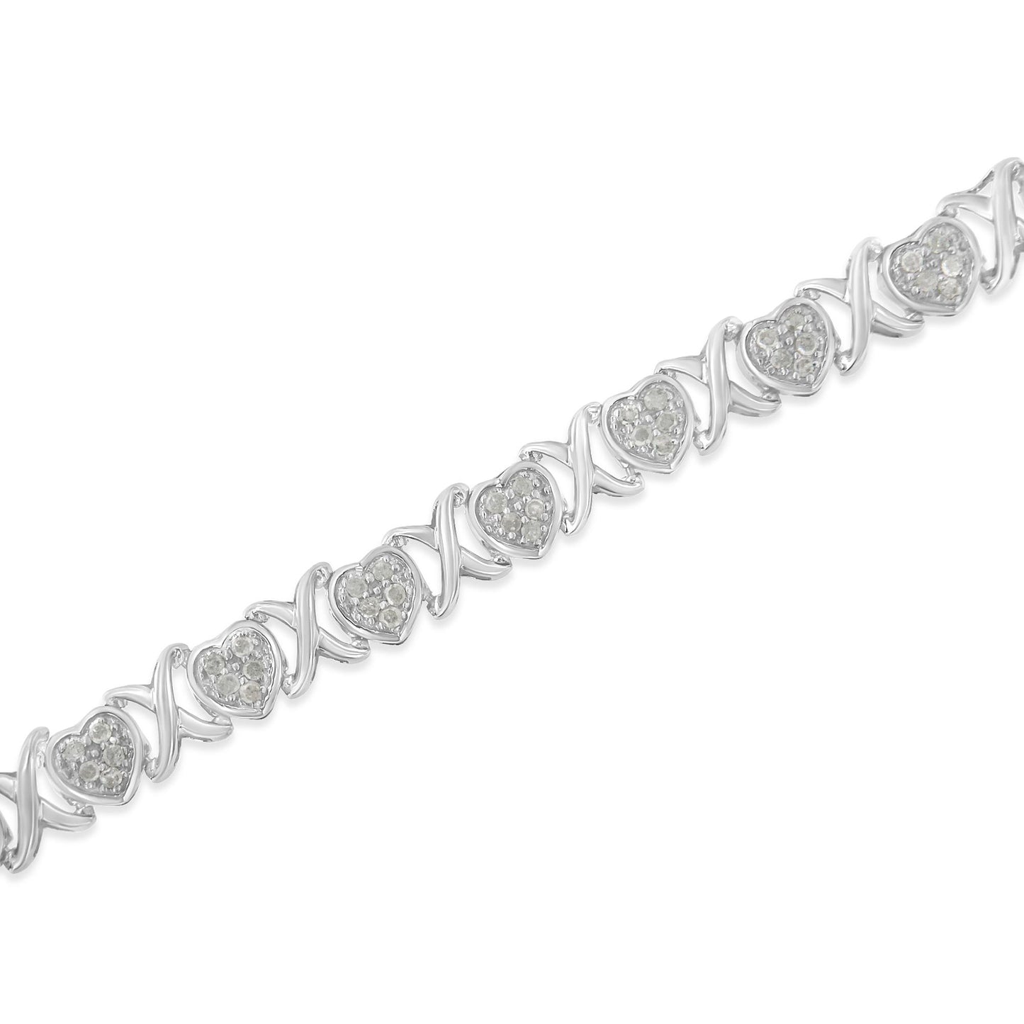 Diagonal close-up of a white metal bracelet featuring alternating heart-shaped settings with white gemstones and twisted links.