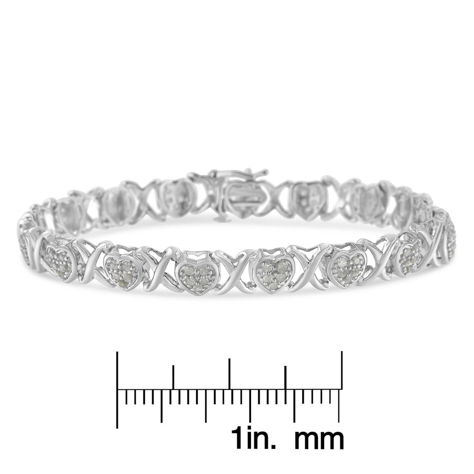 Bracelet with heart-shaped and X-shaped links featuring round white gemstones in a pave setting, shown in a front angle on a ruler for size reference.
