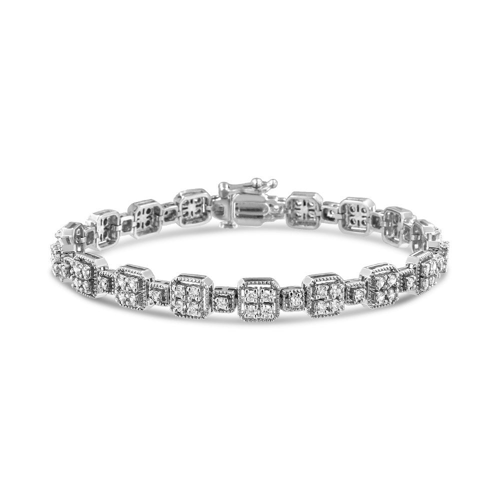 White metal bracelet with square and round settings featuring white round gemstones in a prong setting, displayed at a slight angle on a white background.