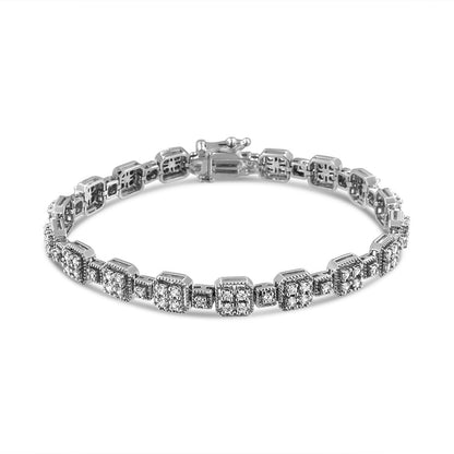 White metal bracelet with multiple square settings featuring clusters of round white gemstones, shown from a slightly elevated front angle.