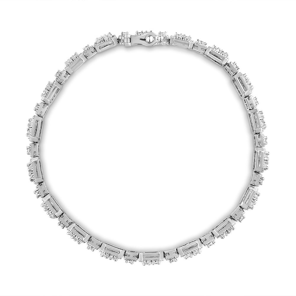 Top-down shot of a white bracelet featuring rectangular links with clusters of prong-set white round gemstones along each link, displayed flat on a white background.