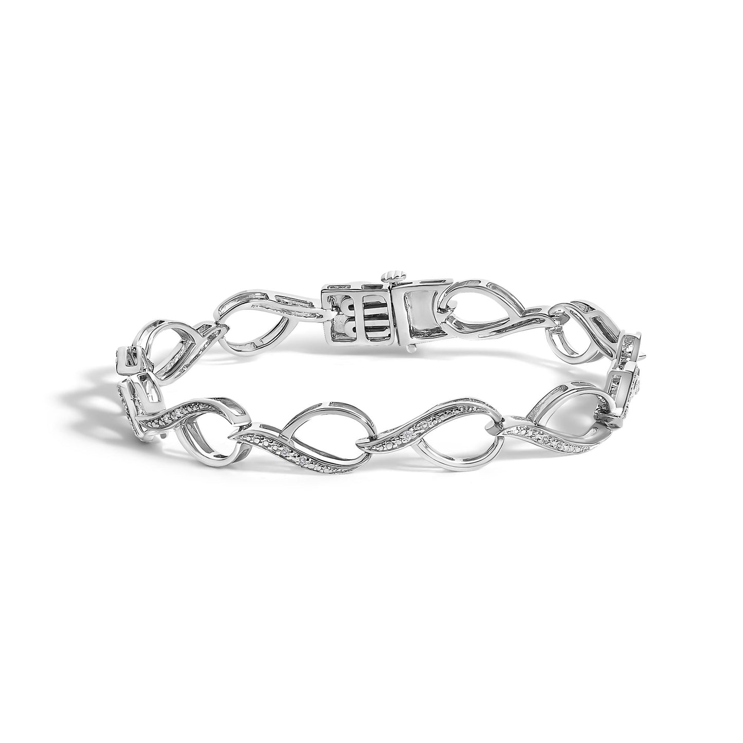 White bracelet with linked open oval shapes, each decorated with small round white gemstones in prong settings, shown in a front angle view on a white background.