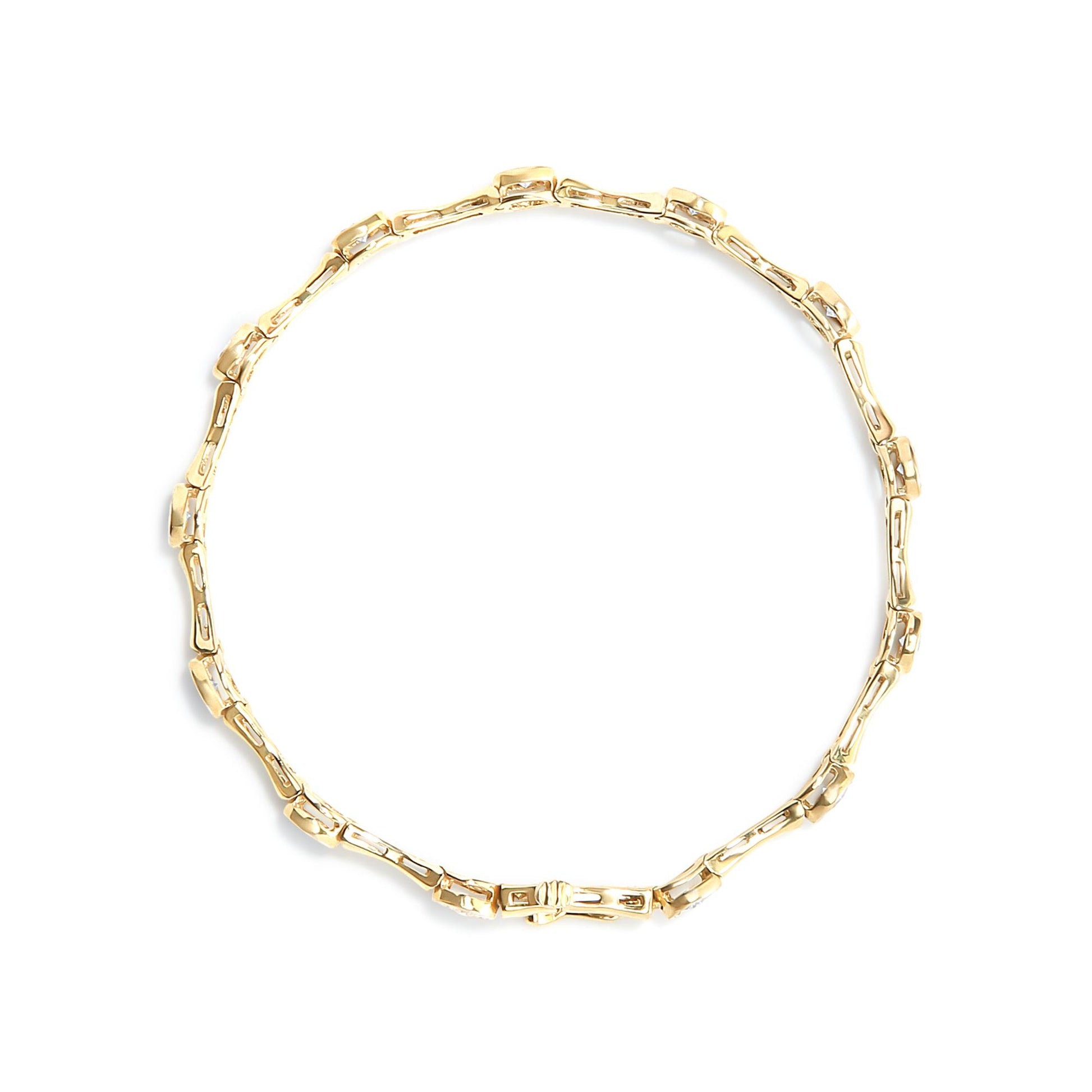Top-down view of a yellow bracelet with linked segments, each set with round white gemstones in a miracle setting.