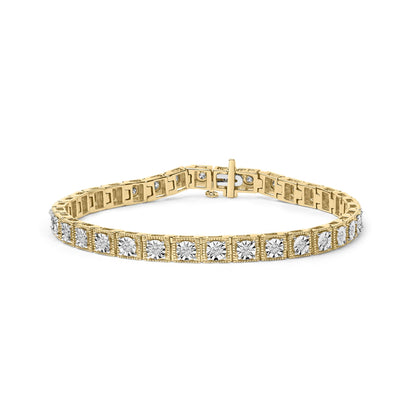 Yellow metal bracelet with round white gemstones in miracle settings, shown from a front angle.