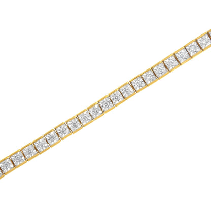 Diagonal close-up of a yellow bracelet featuring square links each set with a round white gemstone in a miracle setting.