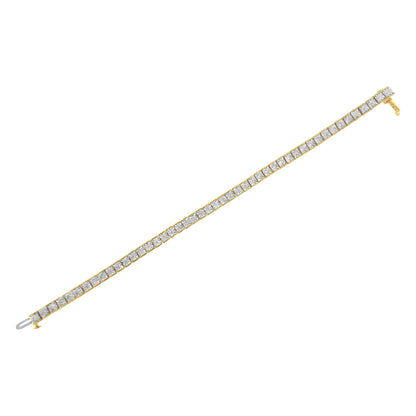 Yellow metal bracelet with a row of round white gemstones in a miracle setting, shown from an angled top view on a white background.