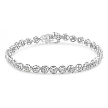 White metal bracelet with round white gemstones in prong settings, shown in a front angle view.