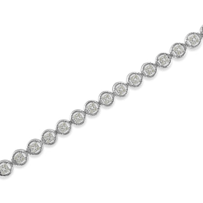 Diagonal close-up of a white metal bracelet featuring round white gemstones in prong settings arranged in circular clusters.