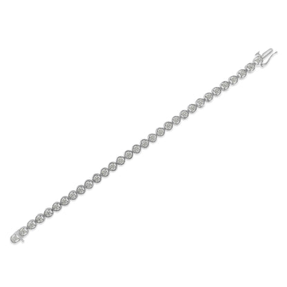 White metal bracelet with round white gemstones in prong settings, shown flat from a top angle.