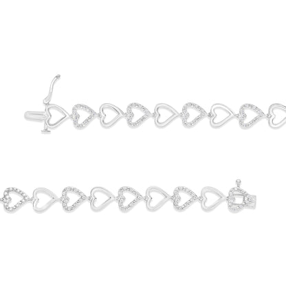 Top and side angle view of a white metal bracelet featuring alternating solid and white gemstone-encrusted open heart shapes, shown unclasped.