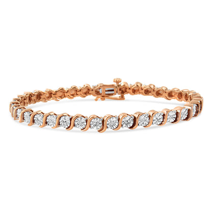 Rose metal bracelet with white round gemstones in miracle setting, shown in a slightly elevated front angle.