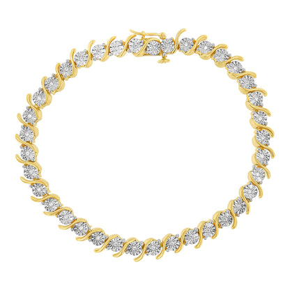 Top-down view of a yellow metal bracelet featuring round white gemstones in a wavy setting.