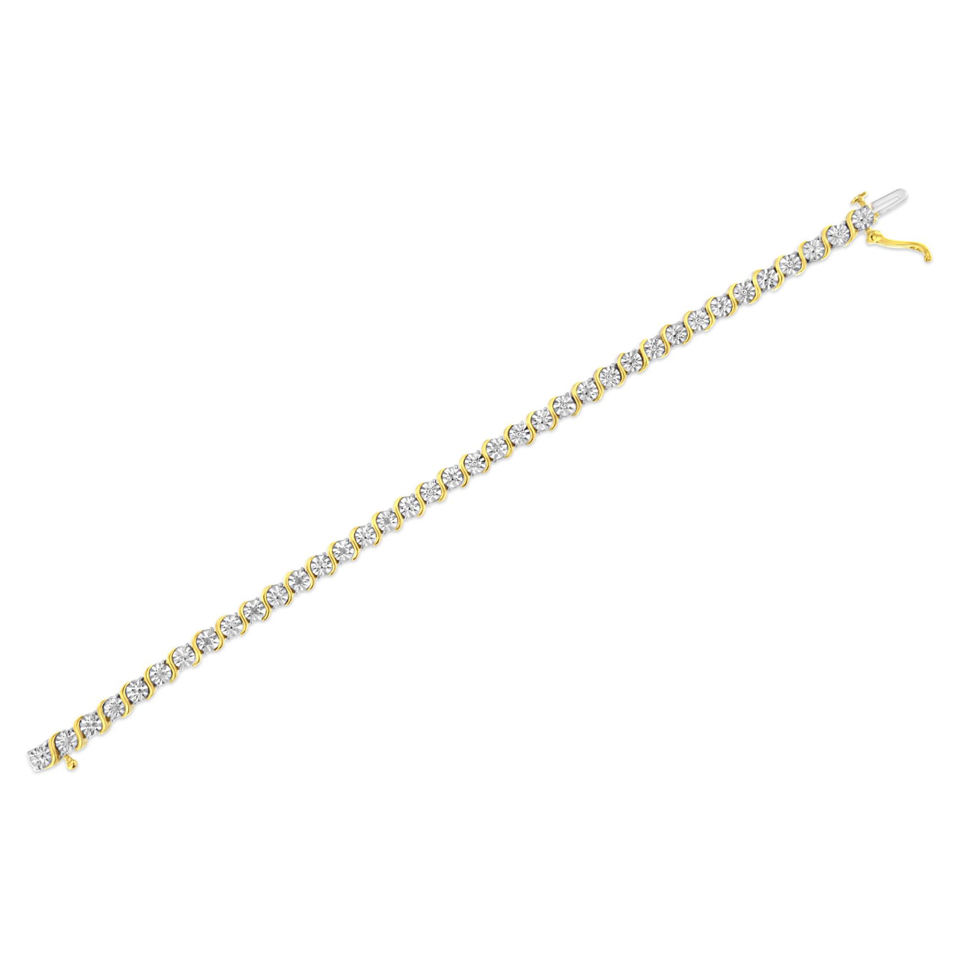 Yellow metal bracelet with round white gemstones in a miracle setting, shown flat at a slight diagonal angle on a white background.