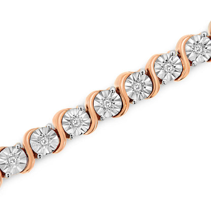 Diagonal close-up of a rose metal bracelet featuring round white gemstones in miracle settings alternating with curved metal accents.
