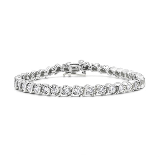 White metal bracelet with round white gemstones in a miracle setting, shown from a front angle.