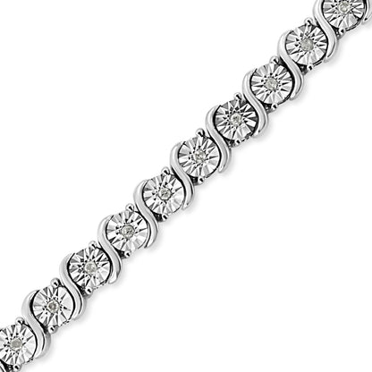 Close-up angled view of a white metal bracelet featuring round white gemstones in miracle settings arranged in a continuous pattern.