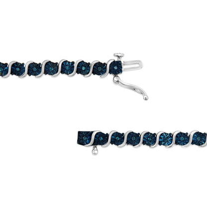 Close-up image of a white metal bracelet with round blue gemstones in a miracle setting, shown from the top angle with the clasp visible.