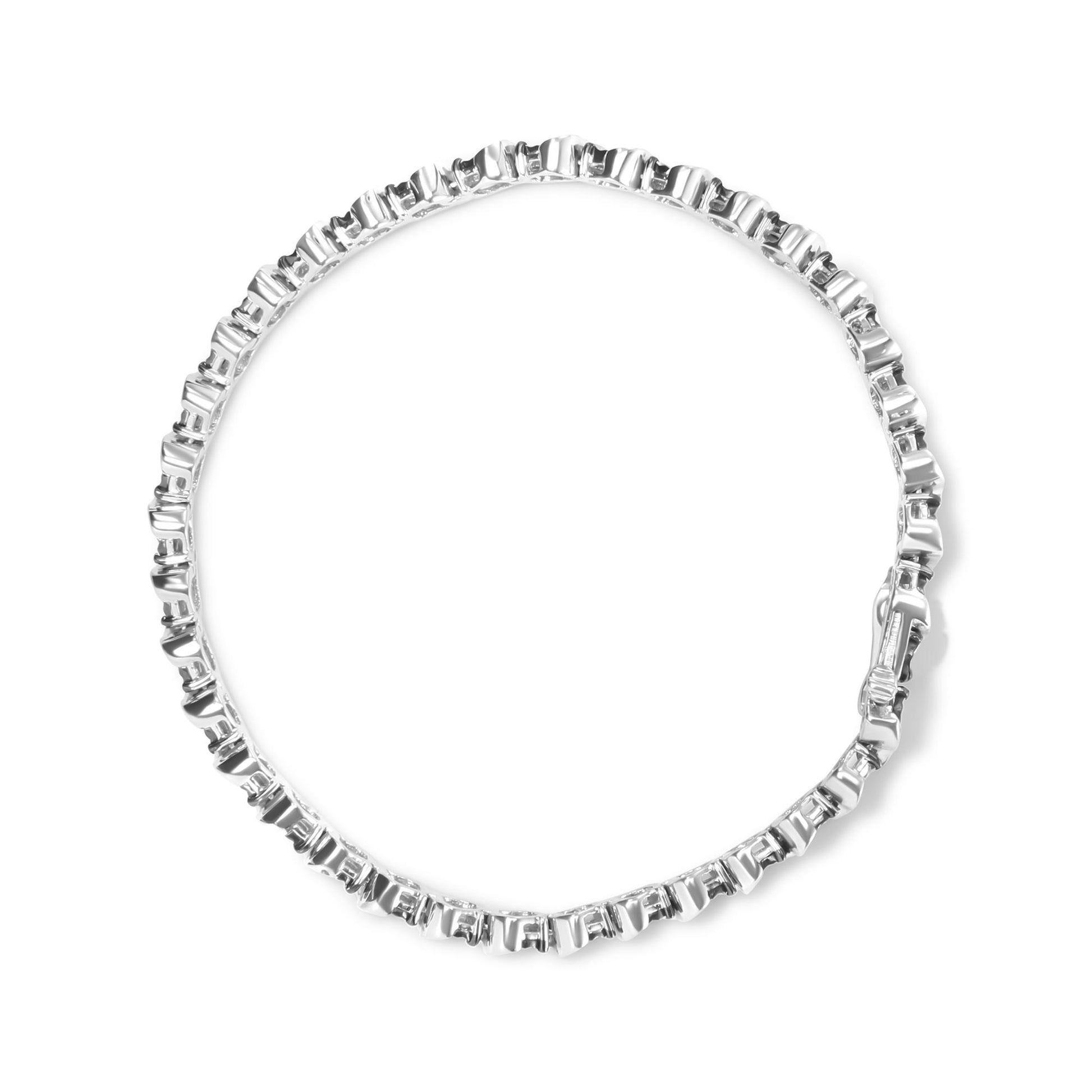 Top-down view of a white metal bracelet with round black gemstones in a miracle setting.