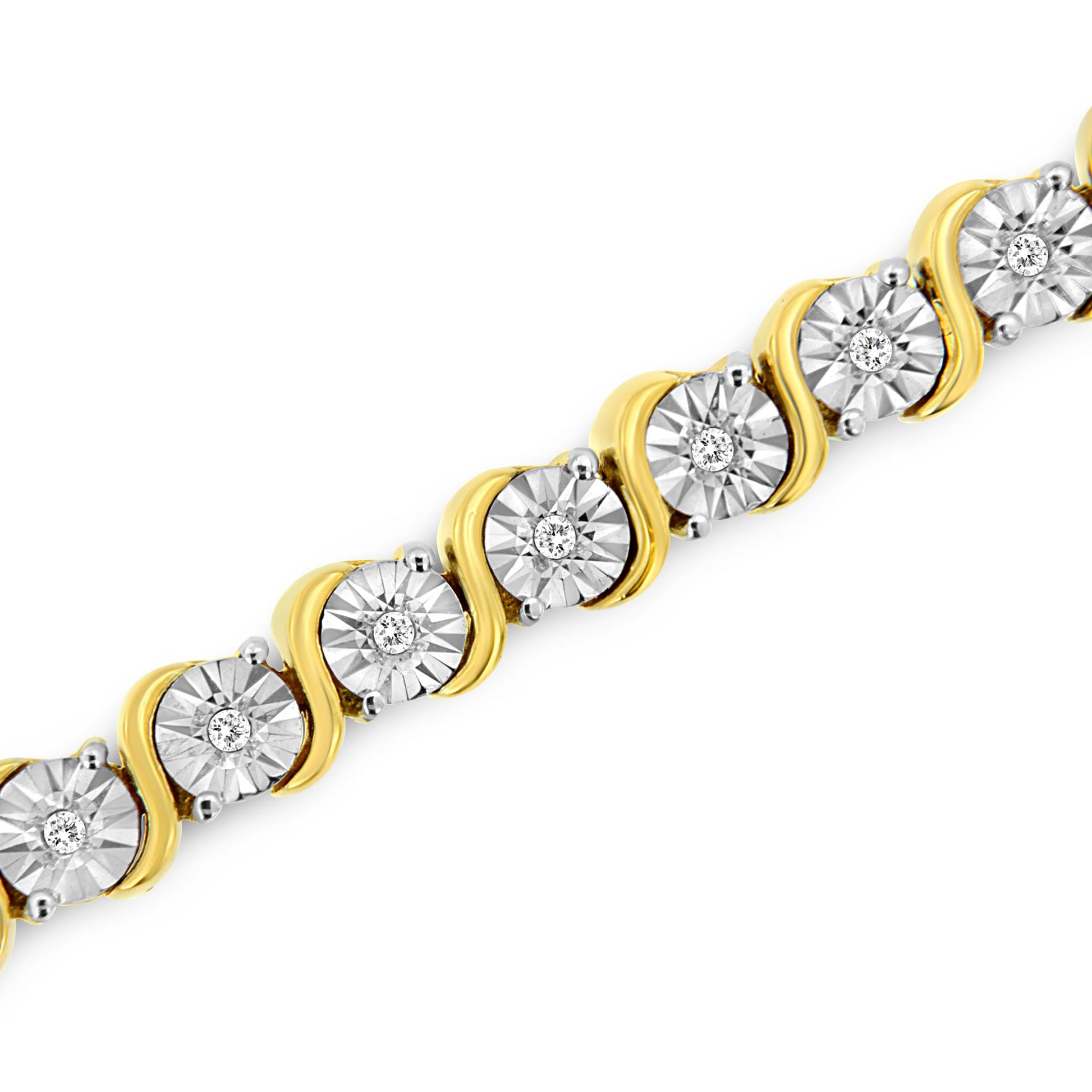 Diagonal close-up of a yellow metal bracelet featuring round white gemstones with a miracle setting.