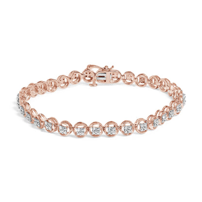 Rose metal bracelet with round white gemstones in prong settings, shown from a slightly angled top view.