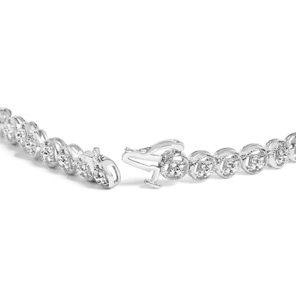 Close-up angled view of a white metal bracelet with round white gemstones in prong settings, showing the clasp open.