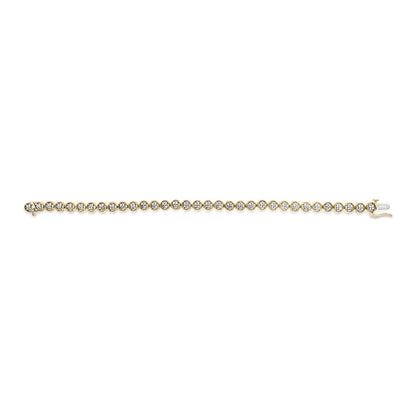Yellow metal bracelet with round white gemstones in prong settings, shown in a flat lay front view.