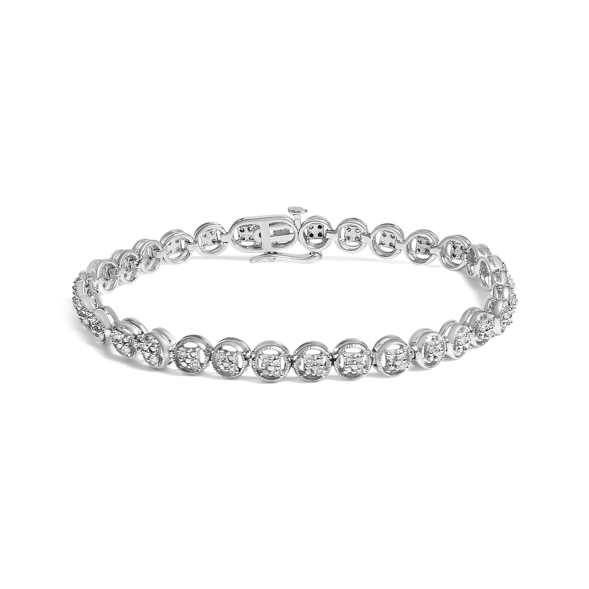 White metal bracelet with round white gemstones in prong settings, shown from a front angle on a white background.