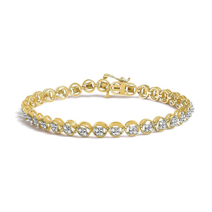 Yellow metal bracelet with round white gemstones in prong settings, shown from a slightly elevated side angle.