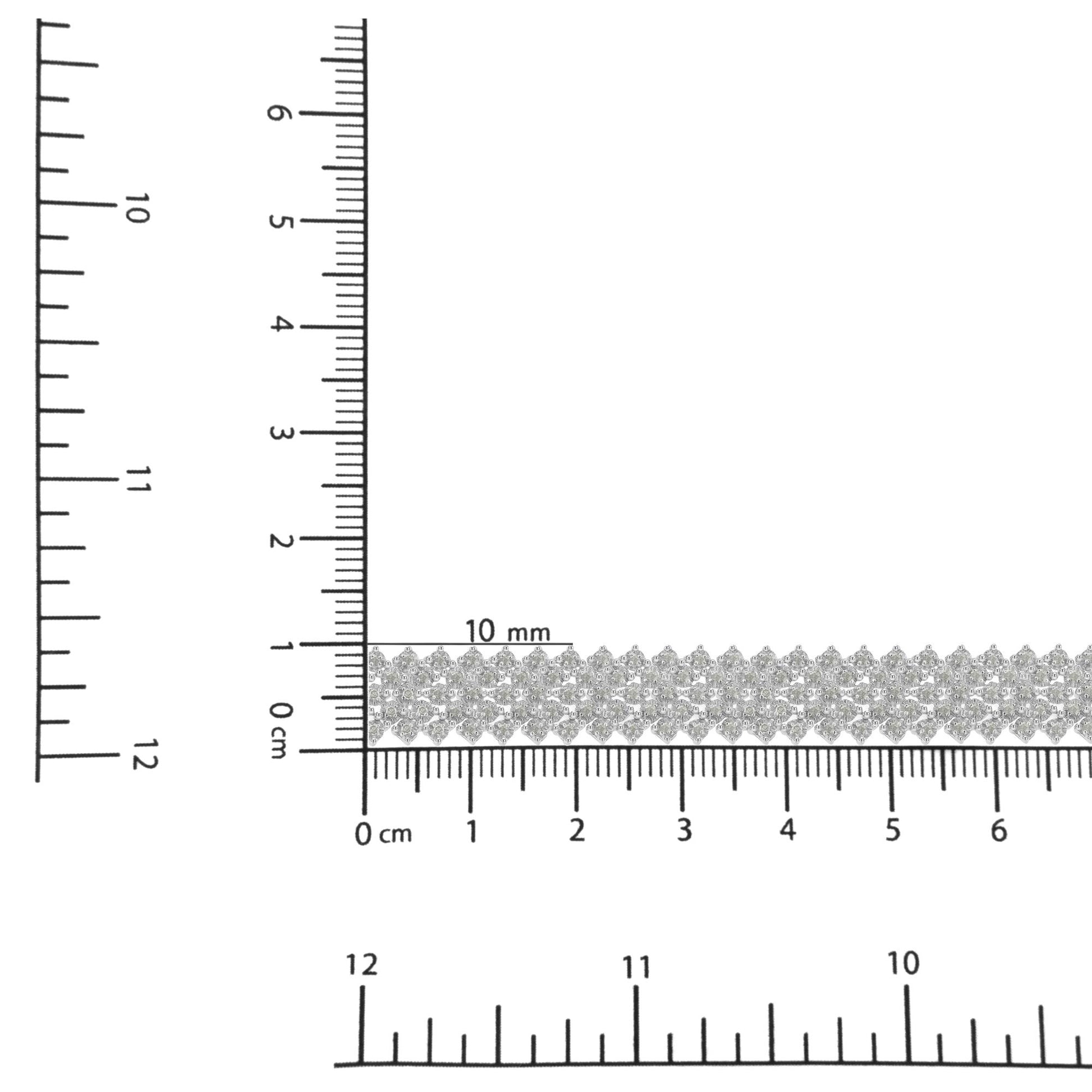 Close-up shot of a white bracelet with multiple small round white gemstones in prong settings, displayed on rulers for size reference.