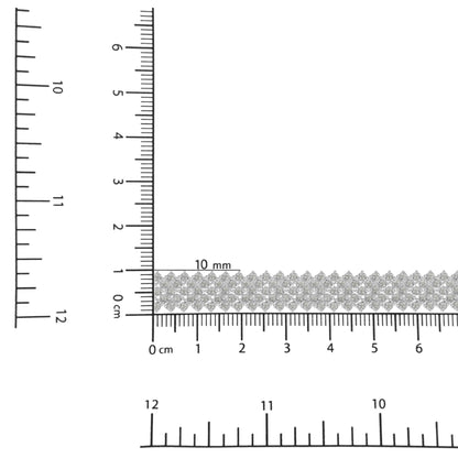Close-up shot of a white bracelet with multiple small round white gemstones in prong settings, displayed on rulers for size reference.