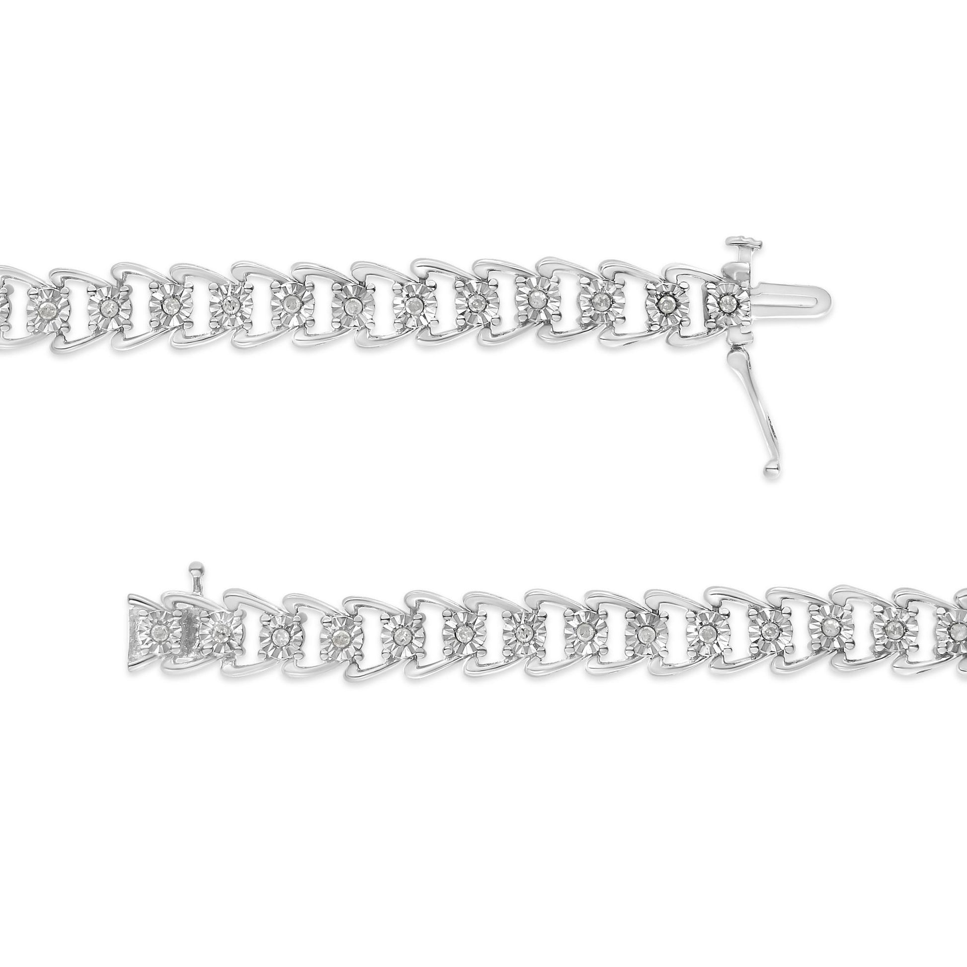 Top view of white metal bracelet featuring linked triangular shapes each set with a round white gemstone in miracle setting, shown fully laid flat.