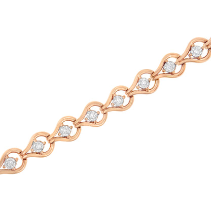 Close-up angled view of a rose metal bracelet featuring round white gemstones in a miracle setting.