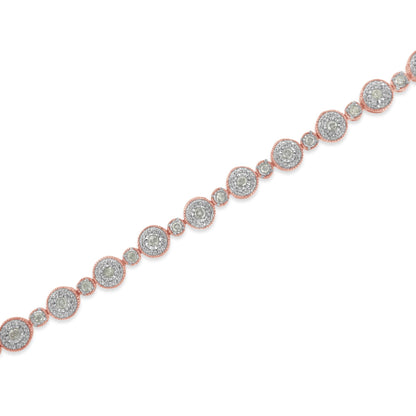 Diagonal close-up of a rose metal bracelet with alternating round and smaller round white gemstones in miracle settings.