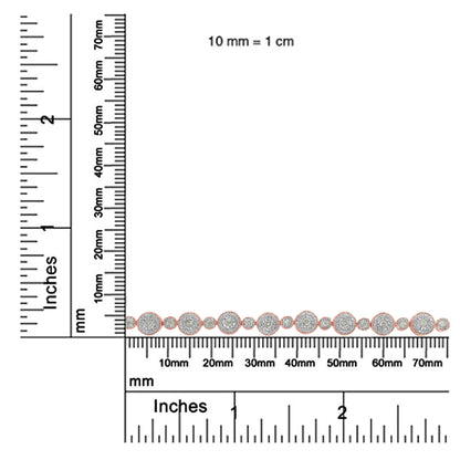 Rose metal bracelet with round white gemstones in miracle settings, shown flat on a ruler for size reference, top-down angle.