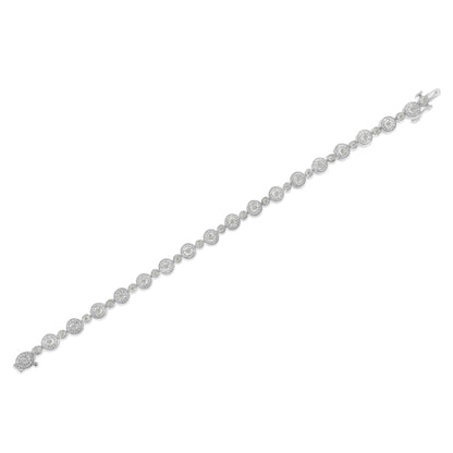 White metal bracelet with alternating small and larger round white gemstones in a miracle setting, shown flat on a white background from a top-down angle.