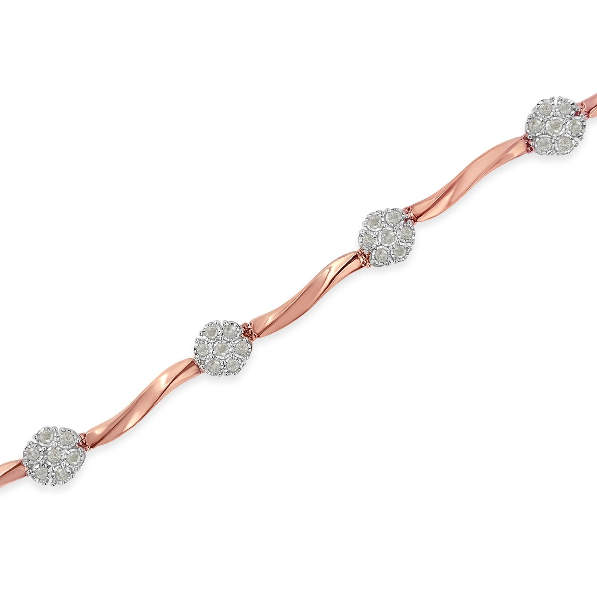 Rose metal bracelet with curved links and clusters of white round gemstones in prong settings, shown at a diagonal angle.