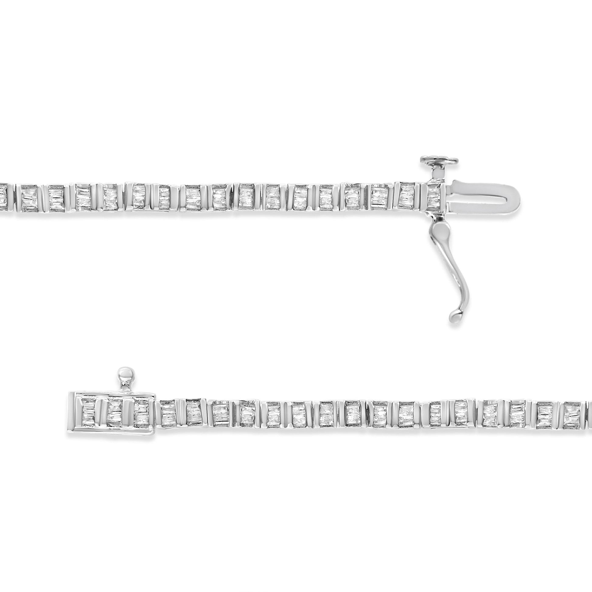 Close-up top view of a white metal bracelet with a channel setting of baguette-shaped white gemstones, showing the clasp open.