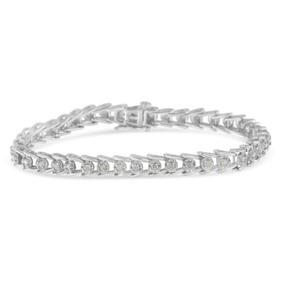 White metal bracelet with round white gemstones in prong settings, shown in a close-up side angle.
