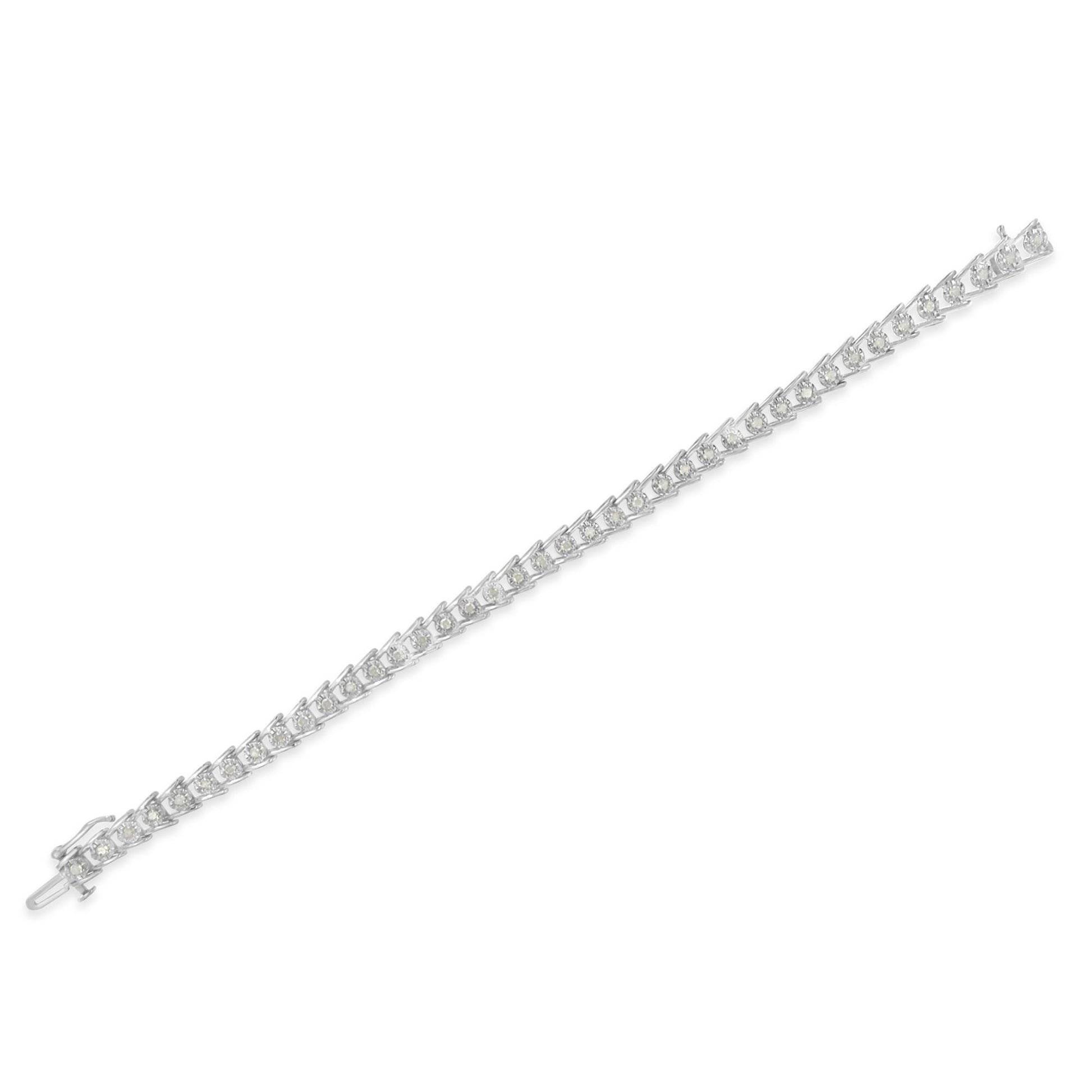 White metal bracelet with round white gemstones in prong settings, shown flat on a white background from a top-down angle.