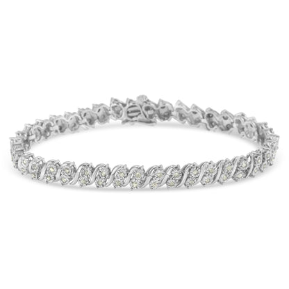 Close-up front angle of a white metal bracelet featuring round white gemstones set in a continuous twisted design.