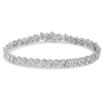 White metal bracelet with round white gemstones in miracle setting, shown in a front angled view.