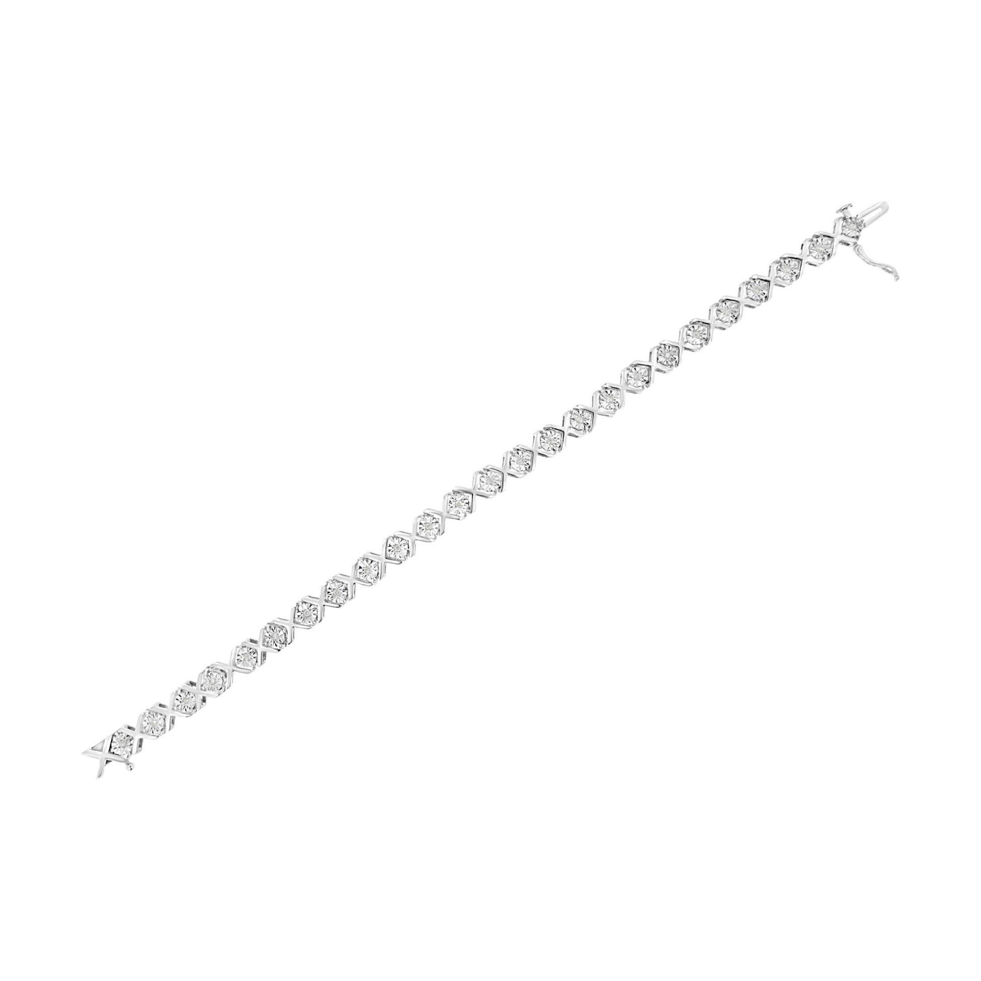 White metal bracelet with a row of round white gemstones in a miracle setting, shown in a top-down diagonal view.