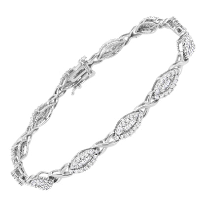 White metal bracelet with alternating oval-shaped sections featuring round white gemstones in pave setting and baguette white gemstones in channel setting, shown from a top angle.